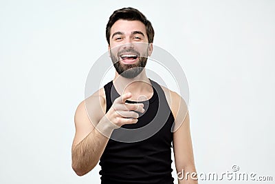 Spanish man mocking you or laughing on his friend joke Stock Photo