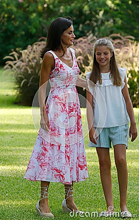 Spanish Queen Letizia and Princess Sofia pose in Marivent palace gardens vertical Editorial Stock Photo