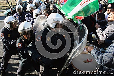 Spanish riot police clash with protestors Editorial Stock Photo