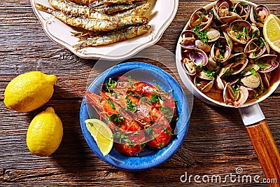 Spanish seafood tapas clams anchovies shrimps Stock Photo