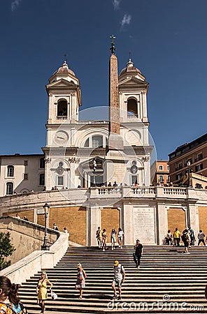 Spanish Steps in Rome, Italy. They lead from Spanish Square to the Trinity Church on the Hill Editorial Stock Photo