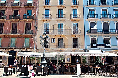 Restaurants in old spanish street in Tarragona, Spain Editorial Stock Photo