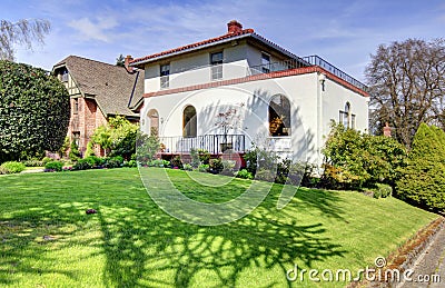 Spanish style white large home front exterior. Stock Photo