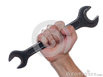 Spanner in hand Stock Photo