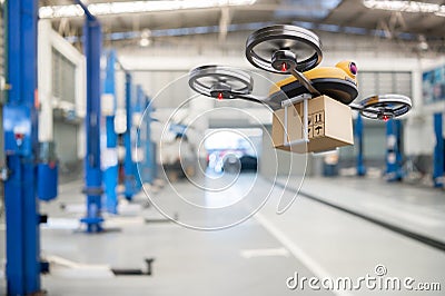 Spare part delivery drone at garage storage in leading automotive car service center for delivering mechanical shipping component Stock Photo