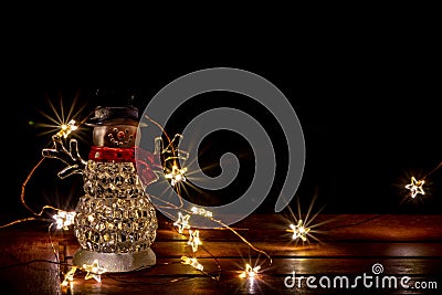 Sparkling christimas lights as illuminated decoration for festive mood on the table create a romantic and shiny atmosphere Stock Photo