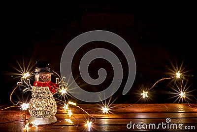 Sparkling christimas lights as illuminated decoration for festive mood on the table create a romantic and shiny atmosphere Stock Photo