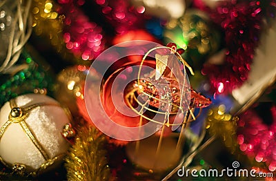 Sparkling christmas tree decorations with tinsels and bokeh Stock Photo