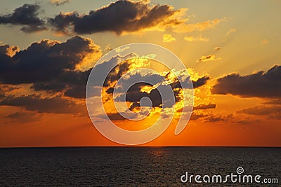 Sparkling sunset above sea Stock Photo