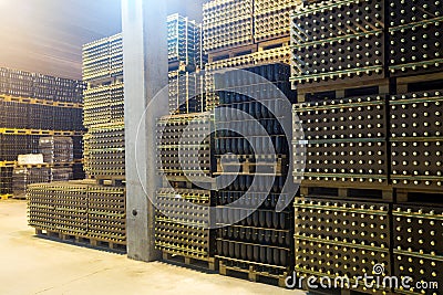 Sparkling wine bottles fermenting in winery Stock Photo