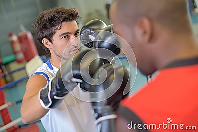 Sparring practise in gym Stock Photo