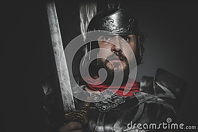 Spartan, Praetorian Roman legionary and red cloak, armor and sword in war attitude Stock Photo