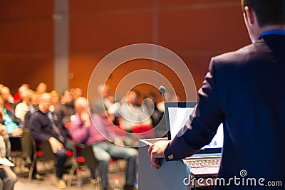 Speaker at Business Conference and Presentation. Stock Photo