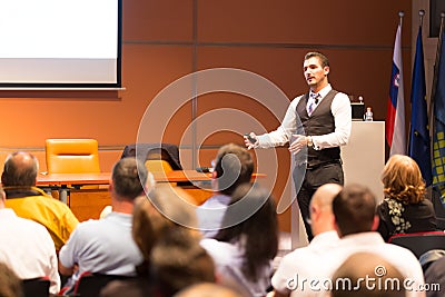 Speaker at Business Conference and Presentation. Stock Photo