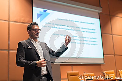 Speaker giving talk at Business Conference. Stock Photo