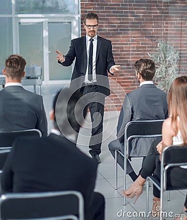 Speaker makes a report at the business seminar. Stock Photo