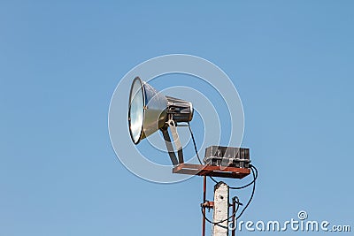 Speaker megaphone white on pole Stock Photo