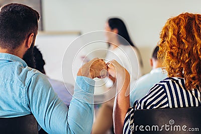 Speaker talking in seminar with many of audiences Stock Photo