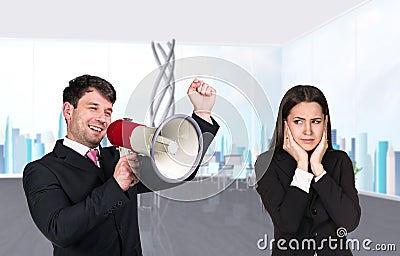 Speaking boss with megaphon Stock Photo