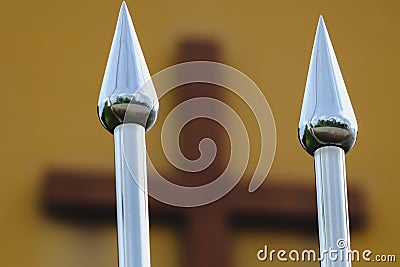 spearhead fence with cross Stock Photo