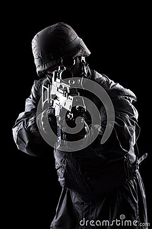 Spec ops soldier on black background Stock Photo