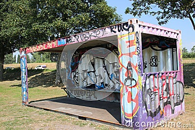 Special container full of graffiti where youth can sit or stand protected Editorial Stock Photo