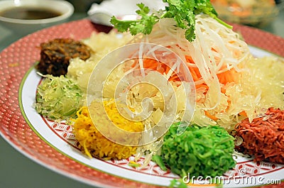 A special dish during Chinese New Year called Yusheng or Yee Sang Stock Photo