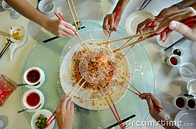 A special dish during Chinese New Year called Yusheng or Yee Sang Stock Photo