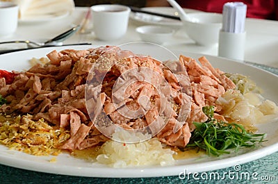 A special dish during Chinese New Year called Yusheng or Yee Sang Stock Photo