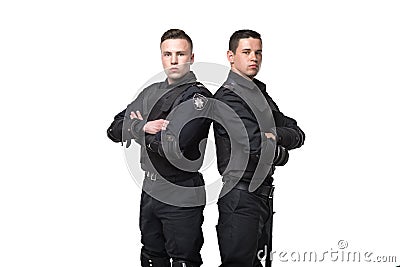 Special force troops with gun and baton Stock Photo