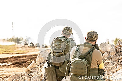 Special forces, soldier assault rifle with silencer, optical sight. behind cover waiting in ambush Stock Photo