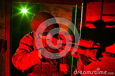 Special forces soldier during night mission Stock Photo