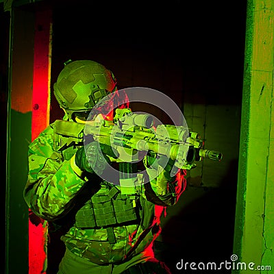 Special forces soldier during night mission Stock Photo