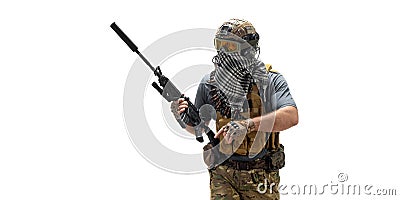 Special Mercenary soldier with an automatic rifle standing and looking to copy space. Stock Photo