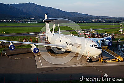 Special mission NATO AWACS plane at air base. Air force flight operation. Aviation and aircraft. Air defense. Military industry. Editorial Stock Photo