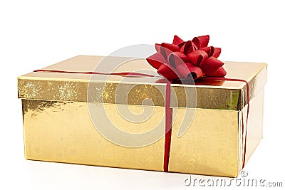 Special occasion present, luxury gifts and giving and receiving presents concept with ornate gold gift box with red bow and ribbon Stock Photo