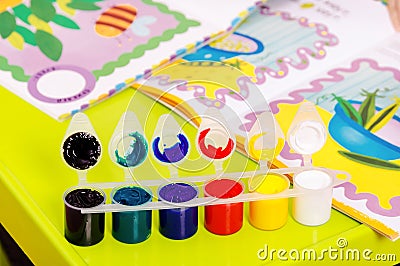 Special paints for children fingers. Finger drawing at home Stock Photo