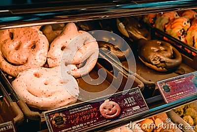 Special pink and dark chocolate Japanese Halloween doughnuts Editorial Stock Photo