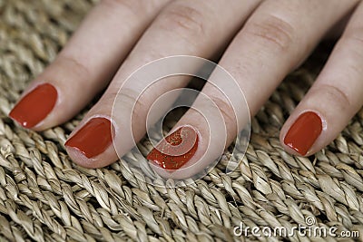 Special red nail lack with shinning parts on one finger Stock Photo