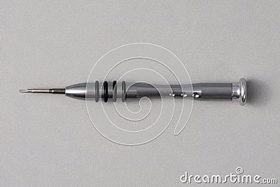 Special steel screwdriver for repair laptop. Stock Photo