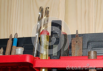 Special wall shelf for various tools. Stock Photo