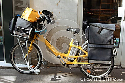 Special yellow courier bike Stock Photo