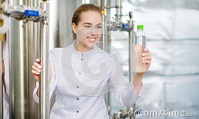 Specialist with bottle of pure water Stock Photo