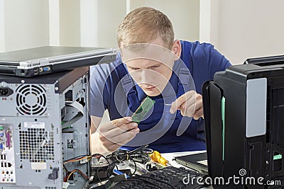 IT specialist installing ram memory Stock Photo