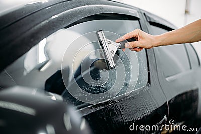 Specialist work, car window tinting installation Stock Photo