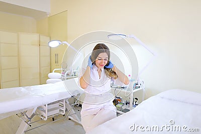 Specialized beautician girl prepares for beginning of working da Stock Photo