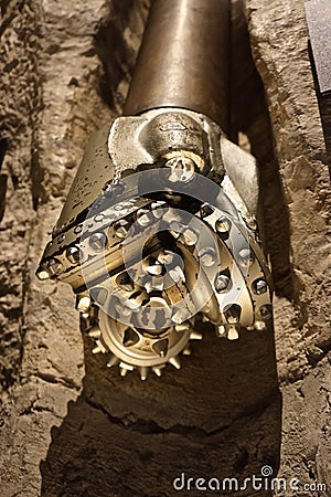 Specialized tri-cone drill bit for oil and gas exploration Stock Photo