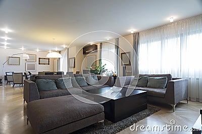 Specious bright living room Stock Photo