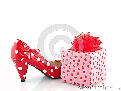 Speckles shoe and present Stock Photo