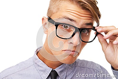Spectacles, optometry and portrait of man in a studio with confused, doubt or squinting facial expression. Vision Stock Photo